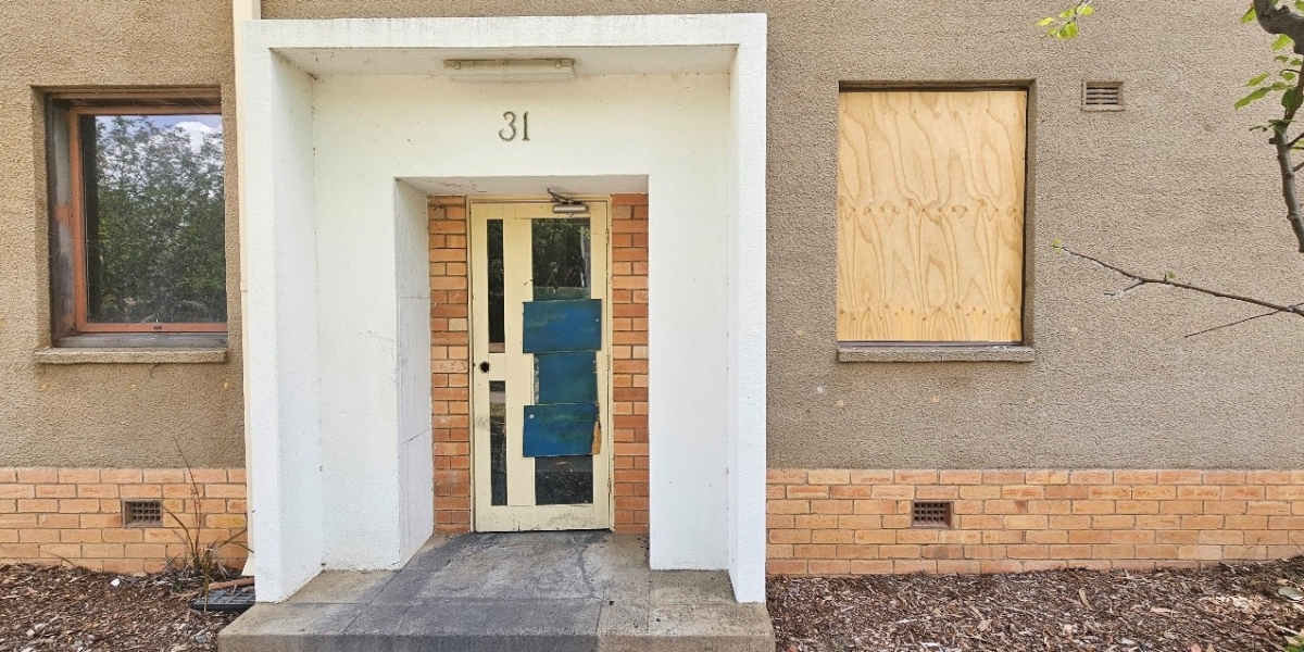 Housing estate with battered doors